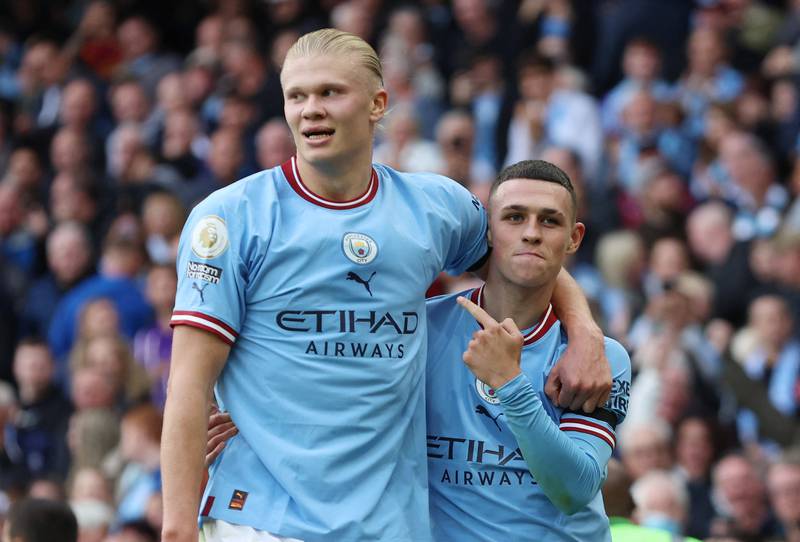 Phil Foden, right, and Erling Haaland both scored hat-tricks in Manchester City's 6-3 Premier League win over Manchester United at the Etihad Stadium on Sunday, October 2, 2022. Reuters