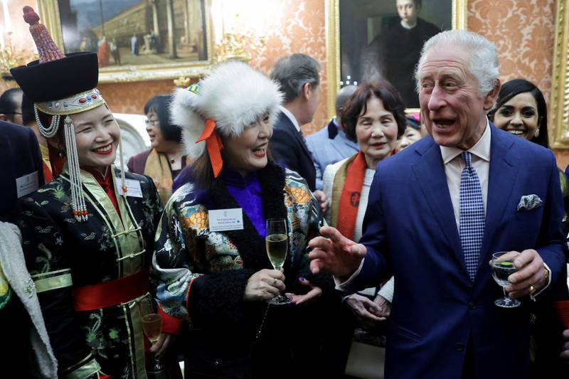King Charles meets Enkhjargal Danzanbaljir, president of the Association for the Development of Mongolian Women in Europe, at a Buckingham Palace reception hosted by the king and Queen Consort Camilla to celebrate the contribution to Britain by East and South-East Asian communities, on February 1. Reuters