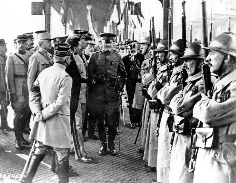 US Army General John J. Pershing, center, inspects French troops at Boulogne, France, on June 13, 1917.