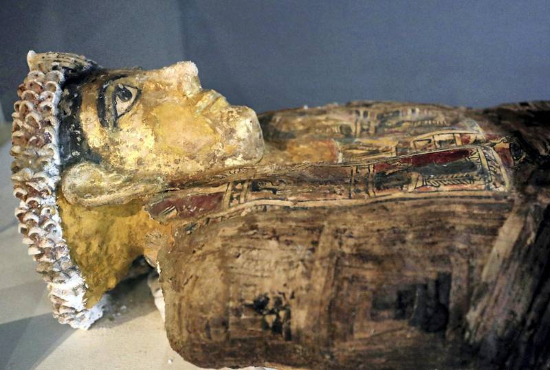 A mummy dated back to the Greco-Roman Period, discovered in a cemetery, is seen displayed in Bahariya Oases near village of Bawity, Egypt March 20, 2021. REUTERS/Mohamed Abd El Ghany REFILE - CORRECTING LOCATION