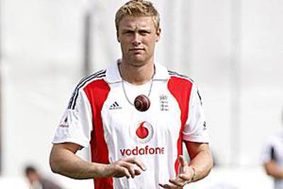 The England all-rounder Andrew Flintoff says he will move his family to Dubai for a few months while he recovers from knee surgery.