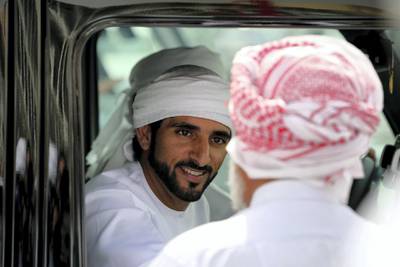 DUBAI, UNITED ARAB EMIRATES - APRIL 16:  Sheikh Hamdan bin Mohammed bin Rashid Al Maktoum Crown Prince of Dubai is pictured during Al Marmoom Heritage Festival at the Al Marmoum Camel Racetrack on April 16, 2014 in Dubai, United Arab Emirates. The festival promotes the traditional sport of camel racing within the region.  (Photo by Francois Nel/Getty Images)