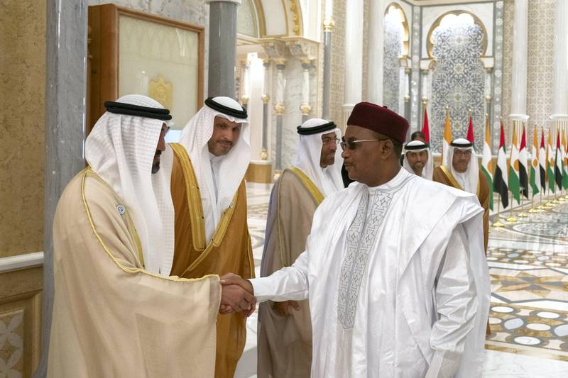 ABU DHABI, UNITED ARAB EMIRATES - December 10, 2018: HE Mohamed Mubarak Al Mazrouei, Undersecretary of the Crown Prince Court of Abu Dhabi (L) greets HE Mahamadou Issoufou, President of Niger (R), during a reception at the Presidential Palace. 

( Hamad Al Kaabi / Ministry of Presidential Affairs )?
---