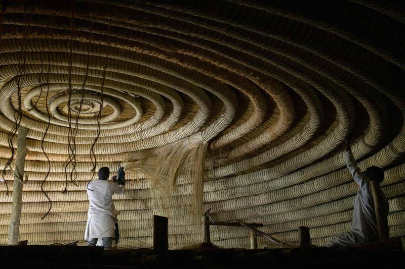 The Kasubi Royal Tombs in Kampala, Uganda, composed of wood, thatch, reeds and plaster, were removed from the In Danger list this year following successful reconstruction. AFP