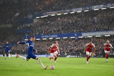 Cole Palmer of Chelsea scores the team's first goal from the penalty spot. Getty