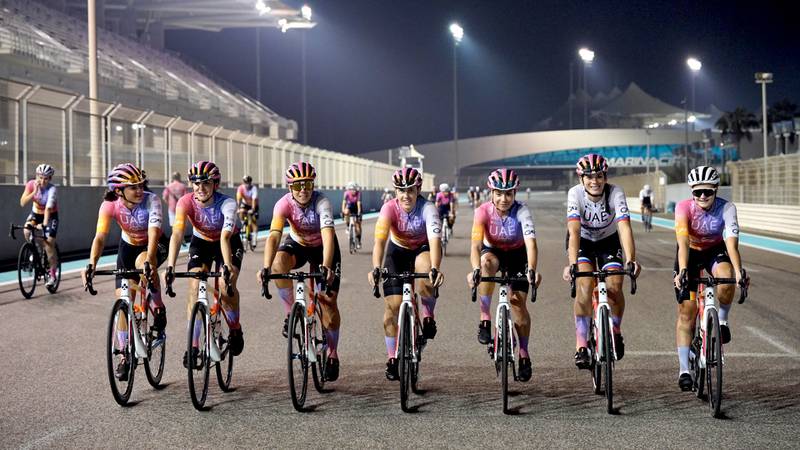 UAE Team ADQ cyclists line up at Yas Marina Circuit in Abu Dhabi. Photo: UAE Team ADQ