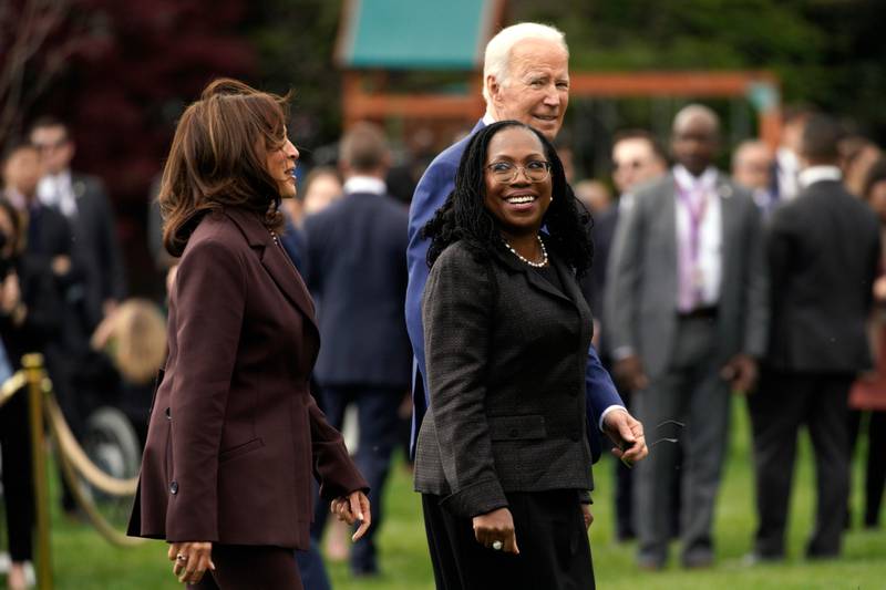 Vice President Kamala Harris, Ms Jackson and Mr Joe Biden depart after the ceremony. Bloomberg