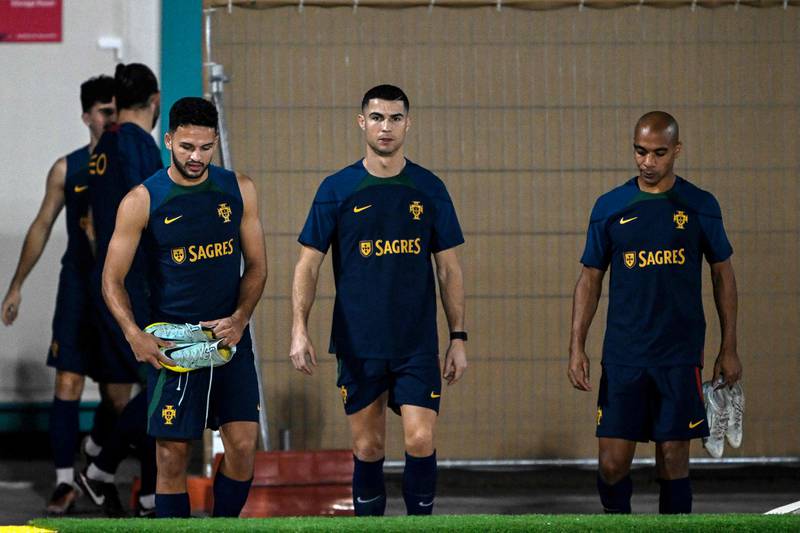Goncalo Ramos, Cristiano Ronaldo and Joao Mario. AFP