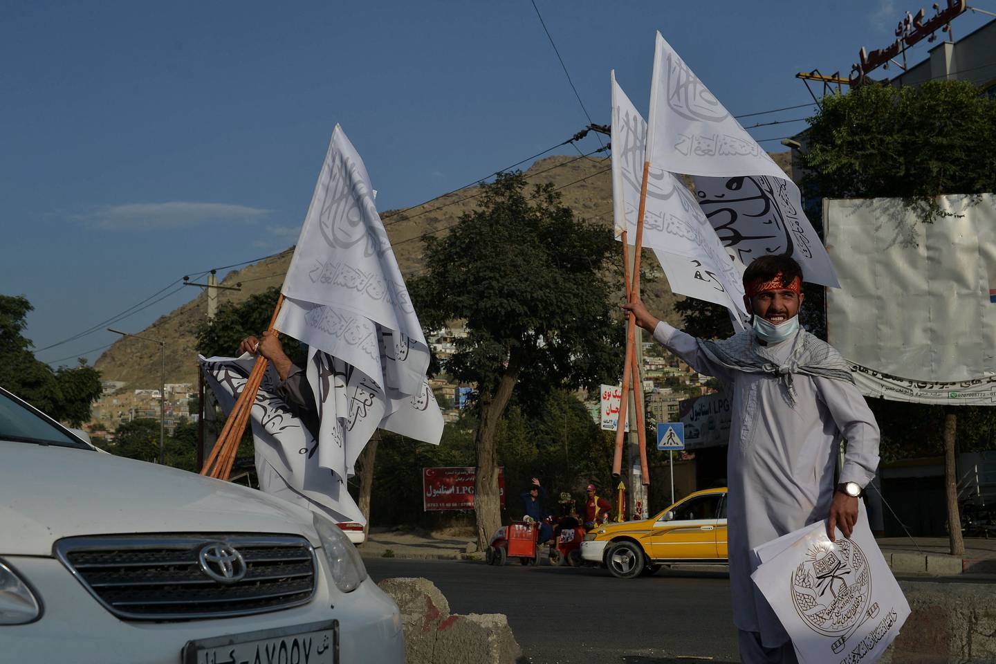 People sell Taliban flags in the Afghan capital Kabul. Photo: AFP