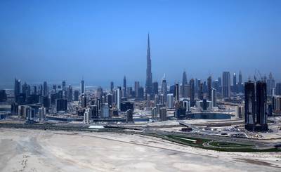 An ariel view shows the Burj Khalifa, the world's tallest tower, dominating the Dubai skyline on April 10, 2016.
For more than 10 years Dubai property prices have been on a roller coaster, creating and wiping out fortunes, but recently they appear to have run out of steam.

 / AFP PHOTO / MARWAN NAAMANI / TO GO WITH AFP STORY BY ALI KHALIL