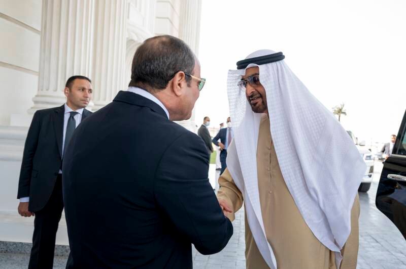 Sheikh Mohamed is received by Mr El Sisi before the reception at El Alamein International Airport. 