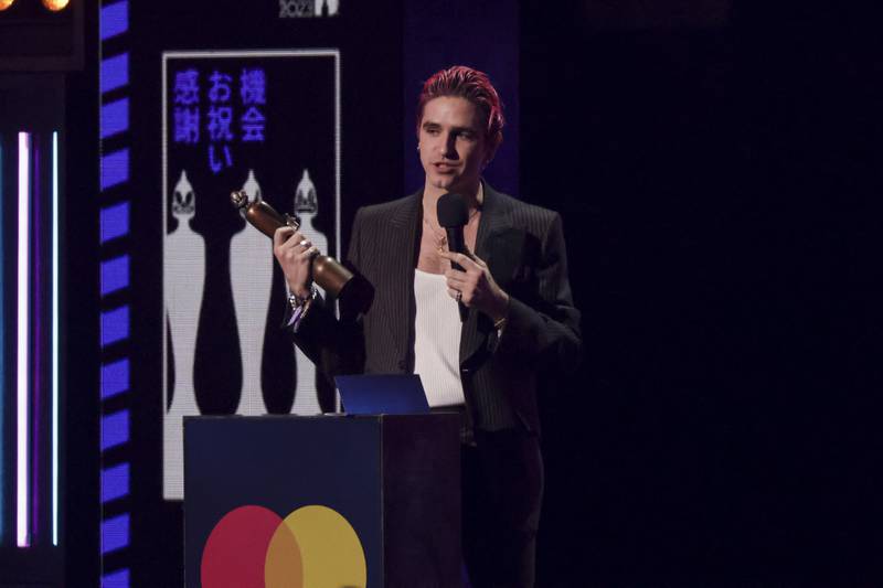 Carlos O'Connell of Irish post-punk band Fontaines DC, on stage accepting the award for International Group of the Year. AP