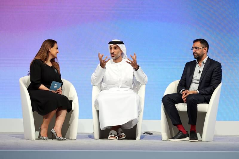 Mina Al-Oraibi, Editor in Chief of The National, Khalfan Belhoul, chief executive of the Dubai Future Foundation, centre, and Azeem Azhar, chief executive of Exponential View, during a discussion, 'Is AI a Force for Good?', at the WEF Global Future Councils meeting in Dubai. Chris Whiteoak / The National