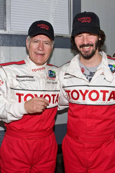 LONG BEACH, CA - APRIL 18:  Television host Alex Trebek (L) and actor Keanu Reeves (R) attend the 33rd Annual Toyota Pro/Celebrity Race on April 18, 2009 in Long Beach, California.  (Photo by Chelsea Lauren/WireImage)
