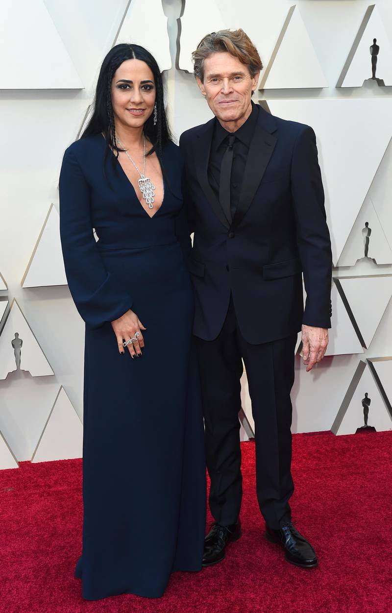 Giada Colagrande, left, and Willem Dafoe in Prada at the 91st Academy Awards. AP