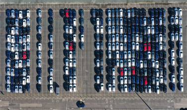 Cars parked up after coming off the production line at the Vauxhall manufacturing plant at Ellesmere Port in north west England . The slump in Britain's car production was the worst January performance since 2009. AFP