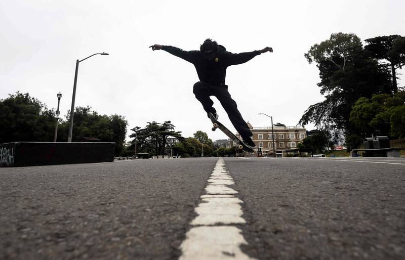 Zion Ricks-Gaines, a blind skateboarder, gets air while doing an ollie at a skateboard park in San Francisco, California. AFP