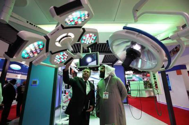 DUBAI , UNITED ARAB EMIRATES – Jan 28 : Visitors looking at the medical and health products on the first day of Arab Health exhibition at Dubai International Convention & Exhibition Centre in Dubai. ( Pawan Singh / The National ) For Business. Story by Zaineb 