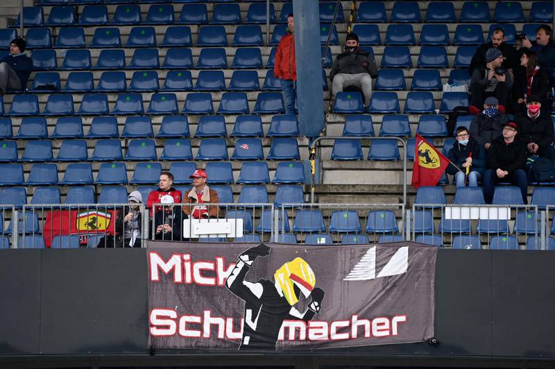 A banner in the stands supporting German driver Mick Schumacher, who was scheduled to drive for Alfa Romeo in the first practice session for the Eifel GP. AP