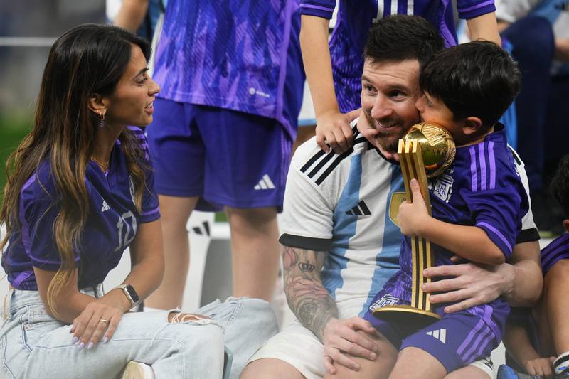 Argentina's captain and hero Lionel Messi celebrates with his family after winning the World Cup. AP Photo
