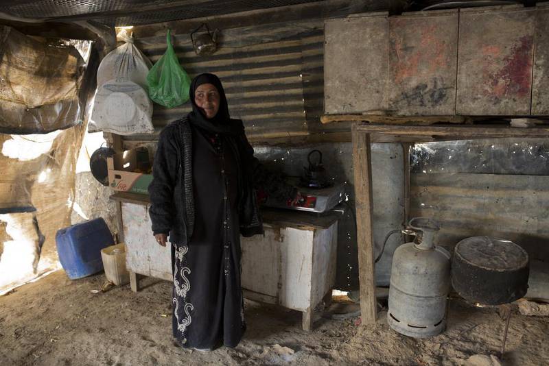 Miriam, one of Maabda’s two wives, standing in the kitchen of her home in Qatamat, one of the many  Bedouin communities that are not recognised by the Israeli government.