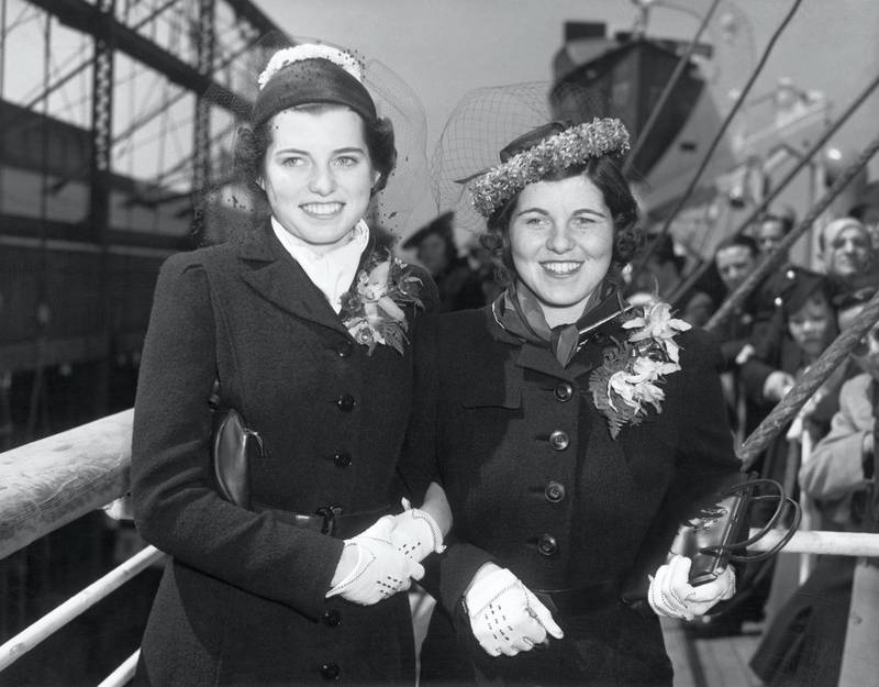 (Original Caption) Photo shows, left to right: The Missies, Eunice and Rosemary Kennedy, as they sailed yesterday on board the S.S. Manhattan of the United States Lines, bound for England, to join their family at the Ambassador's residence at Prince's Gate. Rosemary, has been a student at Marymount Convent, in Tarrytown, N.Y., while her sister Eunice, studied at the Sacred Convent in Noroton, Connecticut. (Photo by George Rinhart/Corbis via Getty Images)