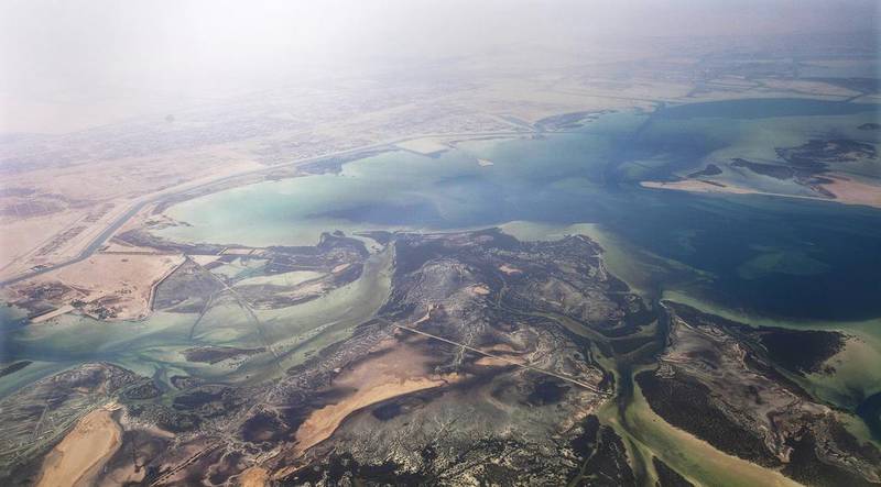 Abu Dhabi's mainland and island coastlines could be at risk from rising sea levels. Razan Alzayani / The National
