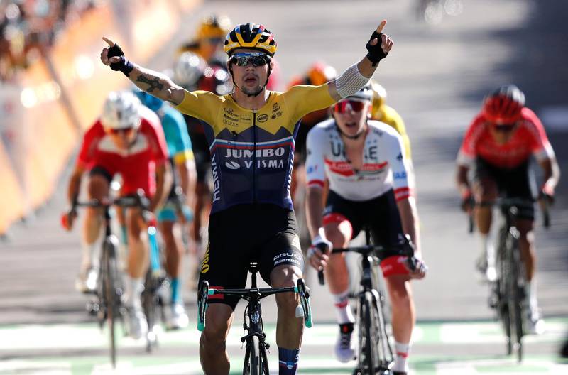 Team Jumbo-Visma rider Primoz Roglic celebrates winning Stage 4 of the Tour de France - ahead of UAE Team Emirates' Tadej Pogacar - on Tuesday, September 1. Reuters