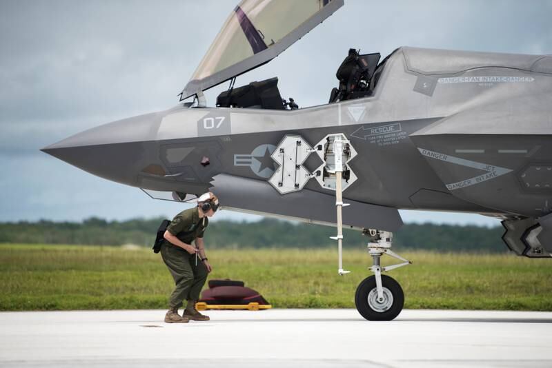 epa07086196 (FILE) - A handout file photo made available by the US Air force on 11 October 2018 shows a US Marine Corps officer preparing a F-35B Lightning II before taking off for a live-fire training exercise on Andersen Air Force Base, Guam, 16 September 2018. The US military announced on 11 October 2018, it grounded its entire F-35 fighter jets fleet in the wake of a jet crash - its first crash of an F-35 aircraft - in South Carolina in September. The Pentagon will investigate a potential issue on faulty fuel tubes. The aircraft are the most expensive ever made.  EPA-EFE/US AIR FORCE/SrA ZACHARY BUMPUS HANDOUT  HANDOUT EDITORIAL USE ONLY *** Local Caption *** 54693337