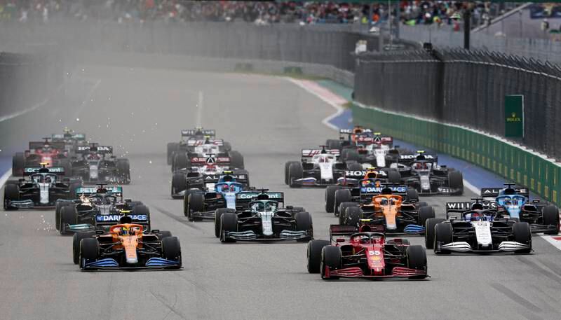 McLaren's  Lando Norris leads the pack at the start of the race. EPA