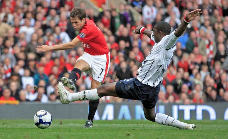Michael Owen shoots during the 2009-10 season, when United finished as runners-up with 85 points. EPA
