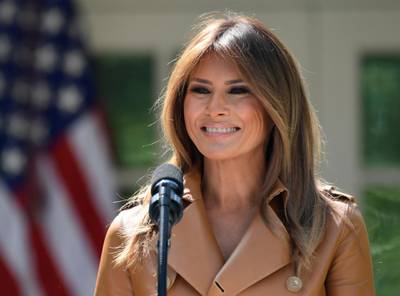 FILE - In this May 7, 2018 file photo, First lady Melania Trump speaks on her initiatives during an event in the Rose Garden of the White House in Washington. President Donald Trump says Melania is â€œdoing greatâ€ nearly two weeks after a medical procedure to treat a kidney condition. Trump answered a reporterâ€™s question about the first lady as he departed the White House on May 25, for a trip to the U.S. Naval Academy graduation in Annapolis, Md. (AP Photo/Susan Walsh, File)