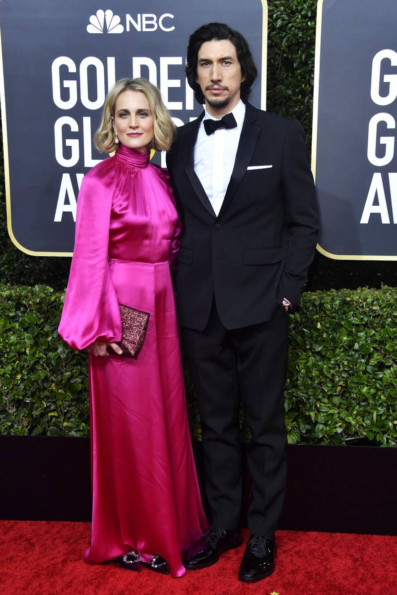 Joanne Tucker and Adam Driver, wearing Burberry, arrive at the 77th annual Golden Globe Awards at the Beverly Hilton Hotel on January 5, 2020. AFP