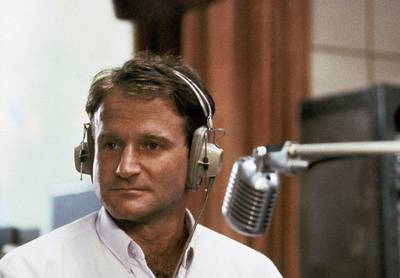 This 1987 file photo released by Touchstone Pictures shows actor Robin Williams in character as disc-jockey Adrian Cronauer in director Barry Levinsons comedy drama, Good Morning Vietnam. AP