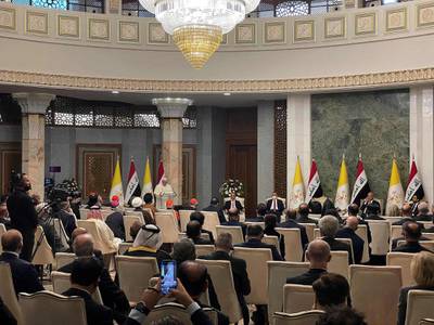 Pope Francis addresses Iraqi officials at the Presidential Palace in Baghdad. AFP