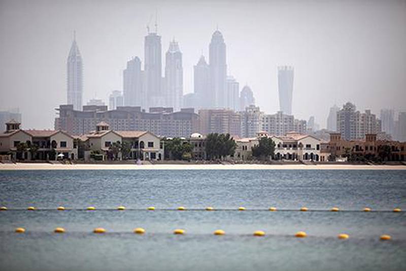 A view of Dubai Marina and Palm Jumeirah from the Palm Jumeirah in Dubai. The total value of mortgages held in the UAE fell 2.4 per cent to Dh156 billion in the first four months of this year. Silvia Razgova / The National







 *** Local Caption ***  sr-130829-SofitelThePalmJones12.jpg