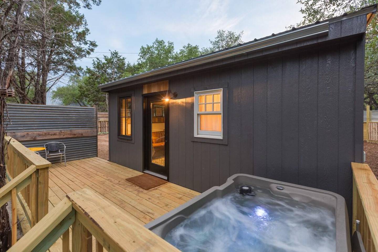 A tiny house with its own hot tub, picnic area and hammocks makes for one of the most romantic Airbnb stays in Texas. Courtesy Airbnb