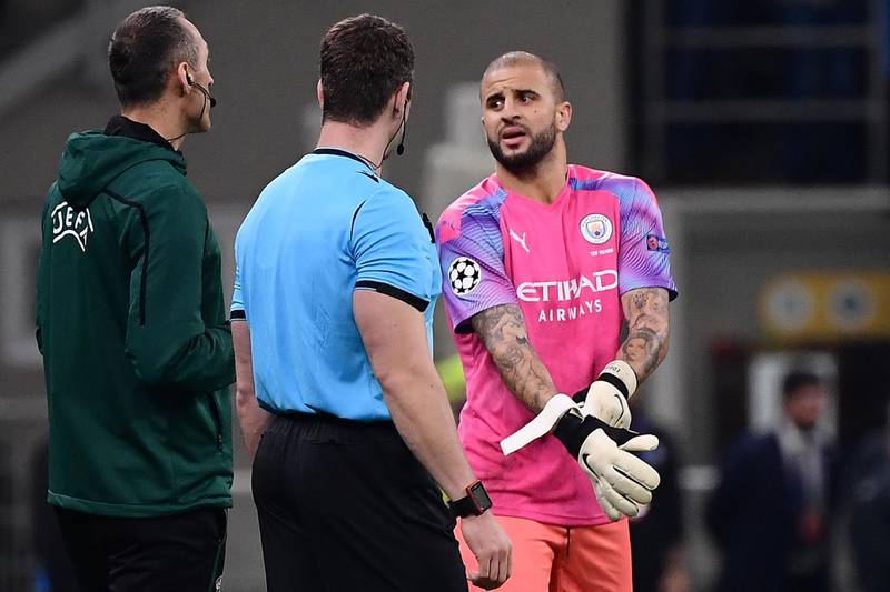 Manchester City defender Kyle Walker prepares to come on to the pitch as a goalkeeper. Reuters