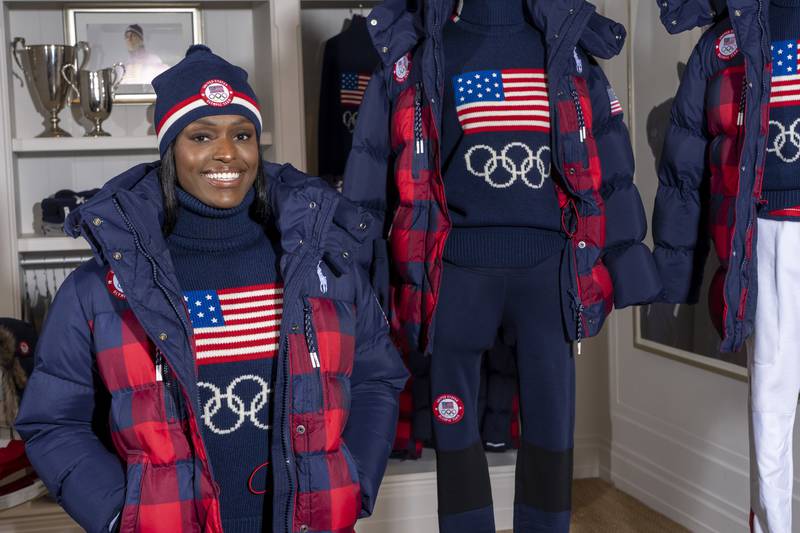 Bobsledder Aja Evans models the Team USA Beijing winter Olympics closing ceremony uniforms designed by Ralph Lauren. AP
