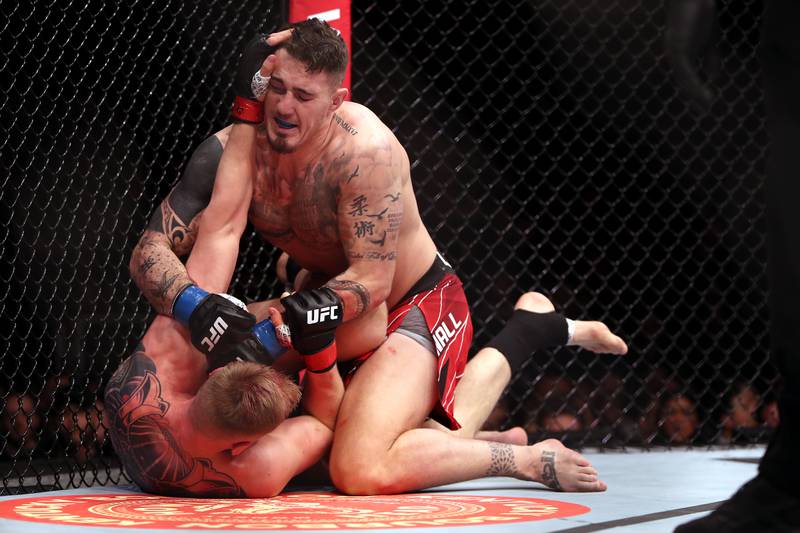 Tom Aspinall pins Alexander Volkov in their heavyweight bout at UFC London. PA