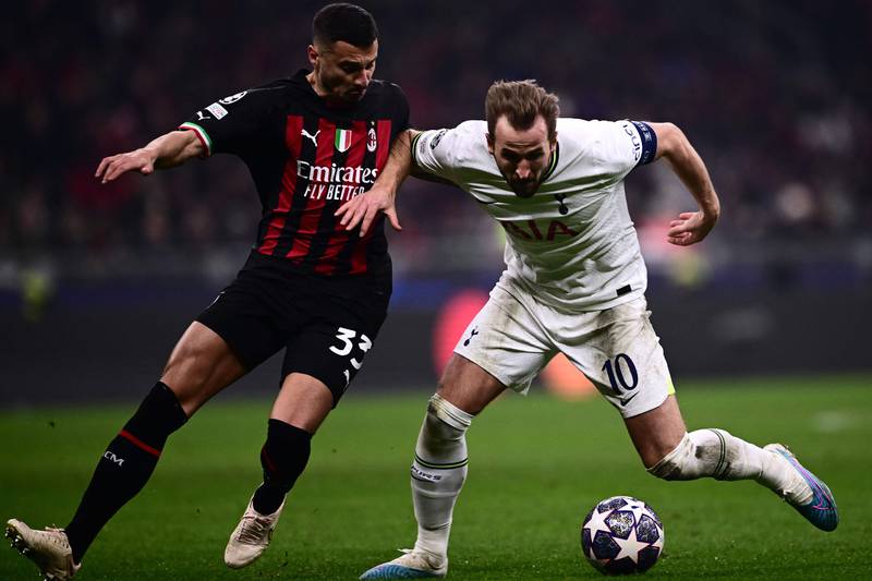 Milan's Rade Krunic and Tottenham's Harry Kane go for the ball. AFP