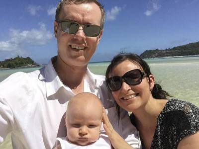 Amanda Tomlinson with her husband Shane and Baby T at the Seychelles. Courtesy Amanda Tomlinson