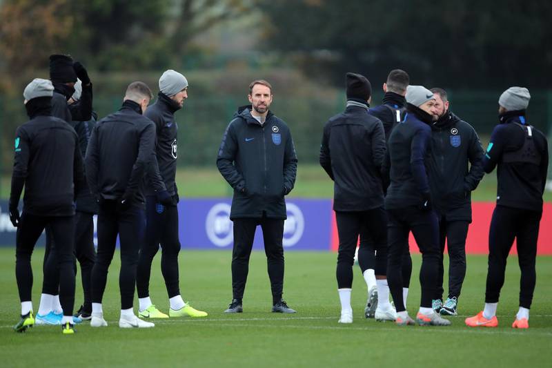 ST ALBANS, ENGLAND - NOVEMBER 16: England Manager Gareth Southgate among his players during an England Media Access Day on November 16, 2019 in St Albans, England. (Photo by Marc Atkins/Getty Images)