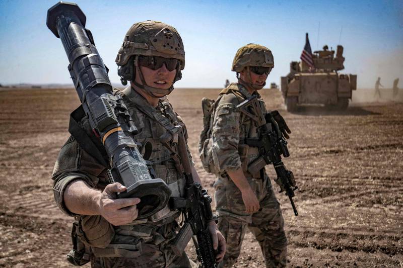 US soldiers on patrol in Syria. Washington says drone attacks on its troops in the country jeopardise the fight against ISIS AFP