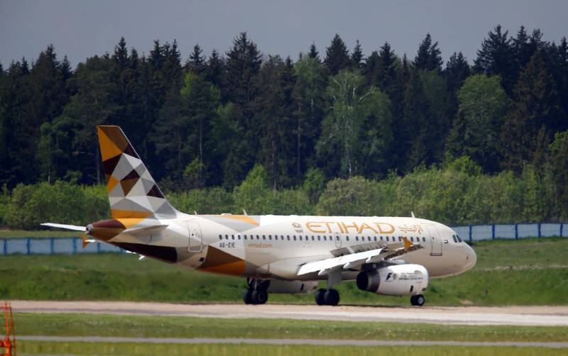 A plane of Etihad Airways company is seen at Minsk international airport near the village of Slabada, Belarus, May 19, 2016.  REUTERS/Vasily Fedosenko - RTX2GJM8