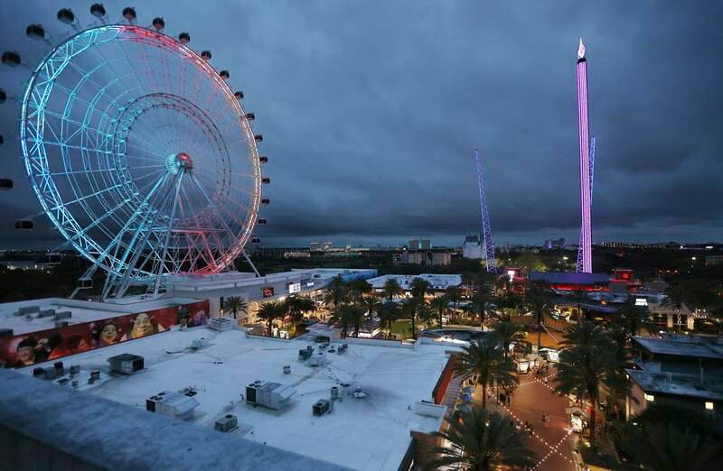 Icon Park attractions, with the Orlando FreeFall on the right, in Orlando, Florida. Orlando Sentinel via AP