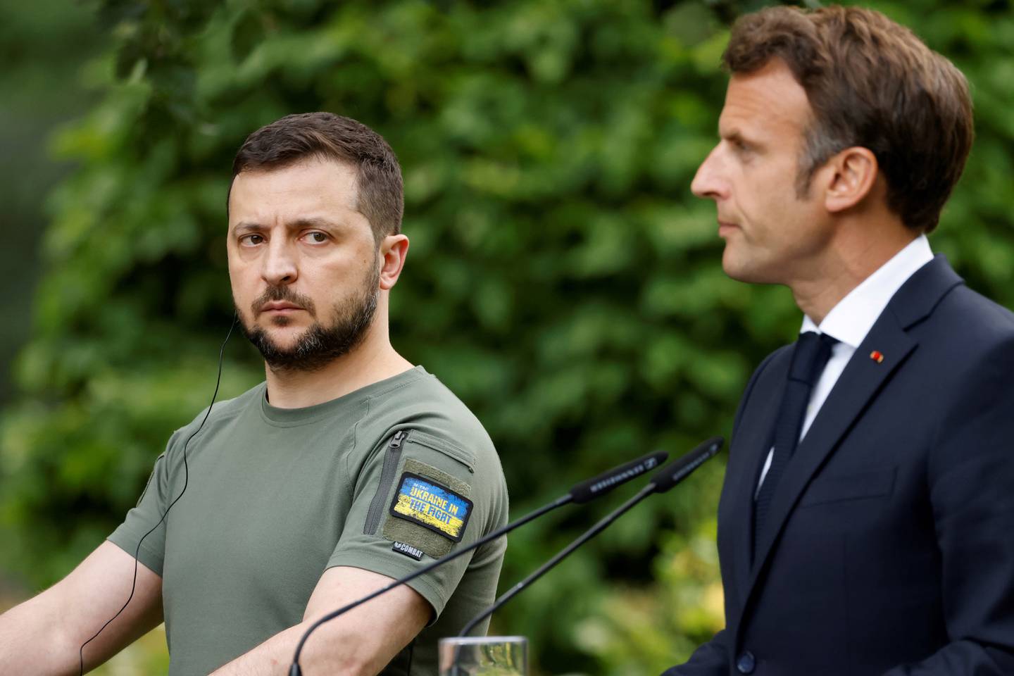 Mr Macron's proposal was meant partly to appease the EU ambitions of Ukrainian President Volodymyr Zelenskyy, left, and other leaders. AP 