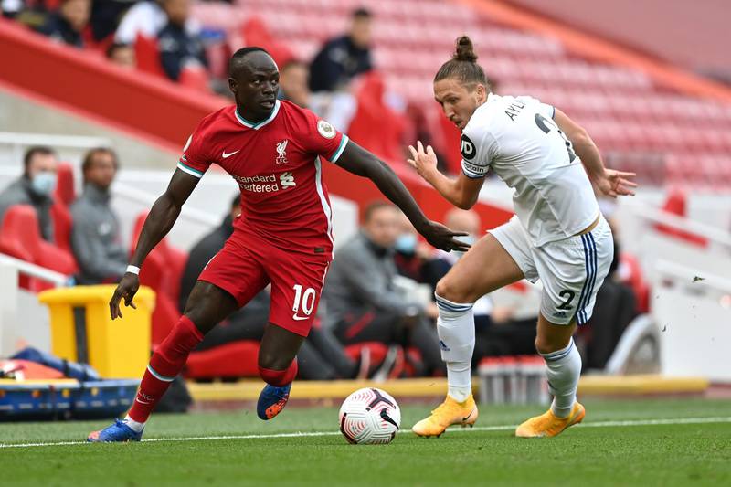 Liverpool's Sadio Mane is challenged by Luke Ayling of Leeds. Getty