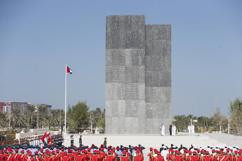 Sheikh Mohamed bin Zayed, Crown Prince of Abu Dhabi and Deputy Supreme Commander of the Armed Forces, during a moment of silence at a Commemoration Day flag-raising ceremony at Wahat Al Karama, November 20, 2016. Photo: Crown Prince Court