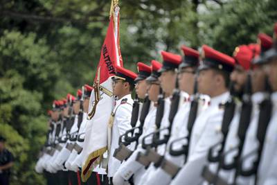SINGAPORE, SINGAPORE - February 28, 2019: Armed forces honour guard participate in an official reception for HH Sheikh Mohamed bin Zayed Al Nahyan, Crown Prince of Abu Dhabi and Deputy Supreme Commander of the UAE Armed Forces (not shown), at the Istana presidential palace.
( Ryan Carter / Ministry of Presidential Affairs )